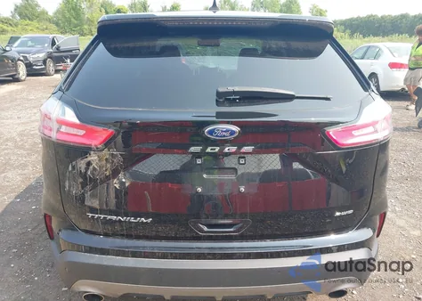 2022 Ford Edge Titanium z USA, uszkodzony, nr VIN 2FMPK4K90NBA39071